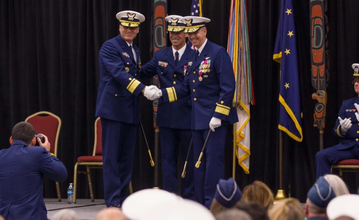 Rear Admiral Michael F. McAllister, Vice Admiral Charles W. Ray, and Rear Admiral Daniel B. Abel pose for a photo at the change of command ceremony in Juneau on June 15, 2016 (Photo by David Purdy/KTOO)