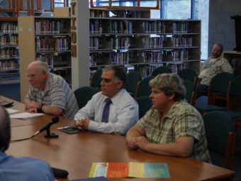 Ted VanBronkhorst (middle) updates the Juneau School Board during June 14, 2016 regular meeting. (Photo by Quinton Chandler/KTOO)