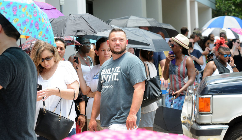 People wait in line to donate blood at the OneBlood Donation Center in Orlando, Fla, on Sunday, after a mass shooting at a gay nightclub left at least 50 people dead and 53 injured. Gerardo Mora/Getty Images