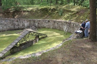 This is where the Burning Brigade was housed. The apparatus in the middle is not the original, but ones like it were used as ramps so that the bodies could be stacked high and set alight. All the pits at Ponar were originally dug by the Russians to store fuel. Ezra Wolfinger for Nova
