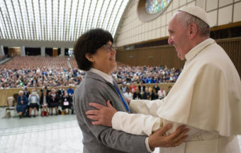 Pope Francis hugs Sister Carmen Sammut, a missionary sister of Our Lady of Africa, at the Vatican on May 12. The pope said he was willing to create a commission to study whether women can be deacons in the Catholic Church, signaling an openness to letting women serve in ordained ministry currently reserved to men.