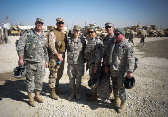 The Gray Team with Maj. Jennifer Bell (center), who ran a concussion clinic, seen in the Helmand province of Afghanistan in 2010: Col. Michael Jaffee (from left) , Capt. James Hancock, Col. Geoffrey Ling, Lt. Col. Shean Phelps and Col. Robert Saum. Courtesy of Christian Macedonia