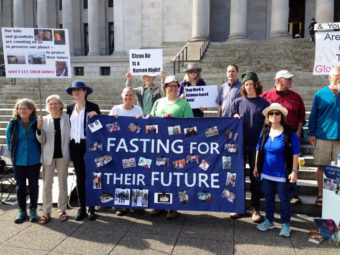 A group that is fasting as part of a protest against Gov. Jay Inslee's Clean Air Rule to cap carbon emissions says the proposed rule doesn't go far enough. (Photo by Austin Jenkins/Northwest News Network)