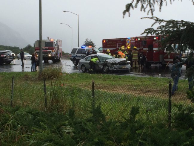 AAuthorities investigate a two-vehicle collision on Egan Drive Saturday, July 23, 2016. (Photo by Kelli Burkinshaw/KTOO)