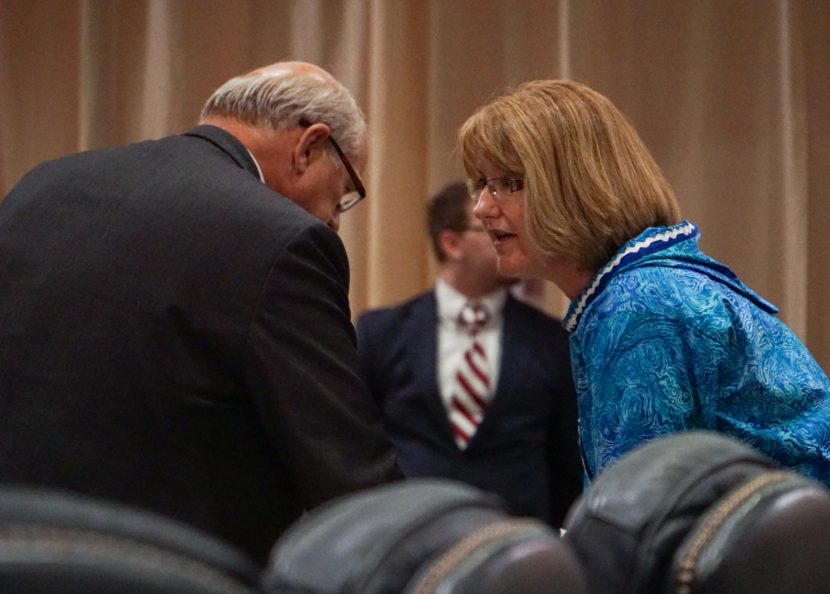 Alaska Senate Majority Leader John Coghill, R-North Pole, and Sen. Anna MacKinnon, R-Eagle River, chat during a break in the floor session, July 18, 2016. (Photo by Jeremy Hsieh/KTOO)