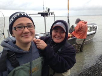 Alithia Belleque and her mother Johanna set net at Coffee Point near Dillingham, and caught Bristol Bay’s 2,000,000,000th salmon on July 6, 2016. (Photo by KDLG)