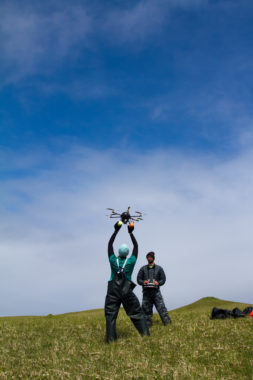 Holding a hexacopter (or drone) before it takes flight. (Photo by Kristen Campbell/Courtesy NOAA Fisheries)