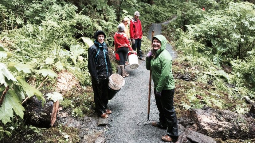 A Trail Mix volunteer crew adds gravel to a muddy part of Juneau's Lemon Creek Trail on National Trails Day, June 4. The trail crosses city and Forest Service land. (Photo courtesy Trail Mix)