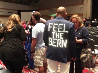 One Sanders fan stated his position in lights on his back at the Democratic Convention in Philadelphia. (Photo by Liz Ruskin/Alaska Public Media)