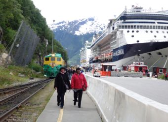 Cruise ships and passengers at Skagway’s railroad dock on May 23, 2016. (Photo by Emily Files/KHNS)