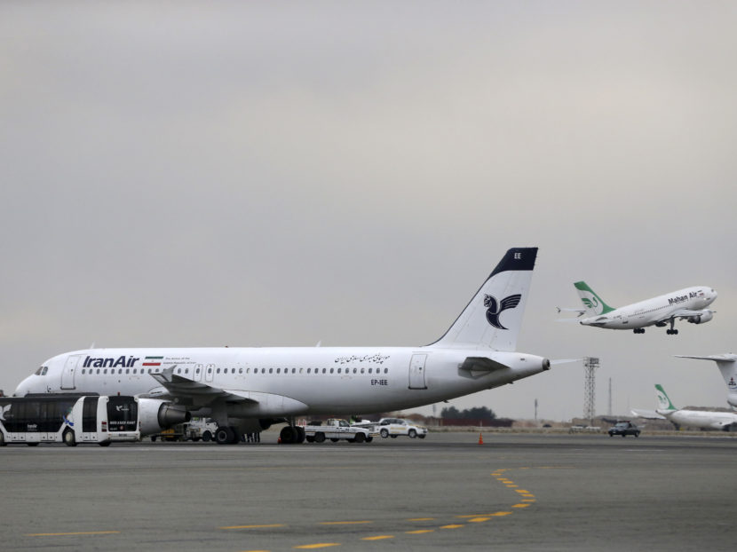 An Iran Air jet sits on the tarmac of Tehran's Mehrabad airport. Last month, Boeing announced it had signed a provisional agreement for the sale or lease of more than 100 aircraft to the national carrier over the next decade. (Photo by Vahid Salemi/AP)