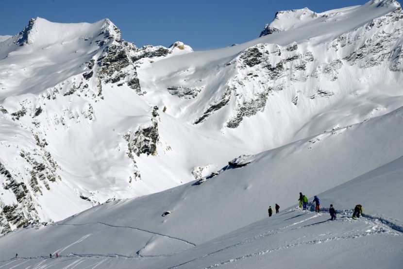 Skiers free-ride down a slope despite a high avalanche risk, at the ski resort in Val-d'Isere, in the French Alps, on March 2, 2014. (Photo by Philippe Desmazes/AFP/Getty Images)