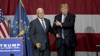 Donald Trump greets Indiana Gov. Mike Pence at the Grand Park Events Center on Tuesday in Westfield, Ind. (Photo by Aaron P. Bernstein/Getty Images)