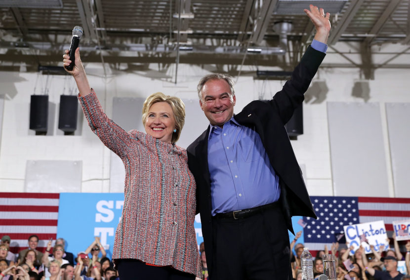 Democratic presidential candidate Hillary Clinton and Sen. Tim Kaine of Virginia greet the crowd during a campaign event on July 14 in Annandale, Va. (Alex Wong/Getty Images)