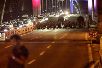 Turkish soldiers block Istanbul's Bosporus bridge on Friday while soldiers also occupied streets in the capital of Ankara. (Photo by Gokhan Tan/Getty Images)