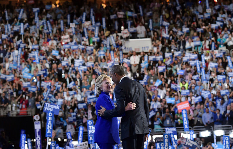 Hillary Clinton joins President Obama after his address at the Democratic National Convention. Mandel Ngan/AFP/Getty Images