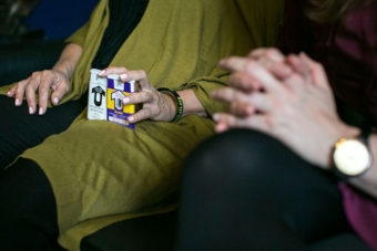 A woman lobbying Congress holds two versions of naloxone which can be used to reverse an opioid overdose. (Photo by Al Drago/CQ-Roll Call Inc.)