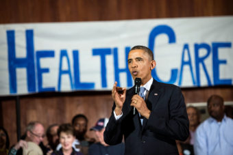 President Obama speaks in Dallas in 2013 about the technical problems that affected the initial rollout of the Affordable Care Act. Now, citing the law's success, he is urging Congress to expand the insurance offerings. (Photo by Brendan Smialowski/AFP/Getty Images)
