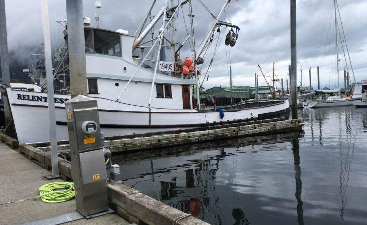 The F/V Relentless docked in Petersburg’s South Harbor and the crew removed their net. (Photo by Abbey Collins/KFSK)