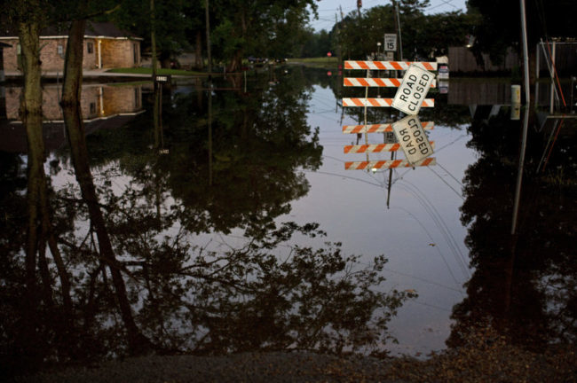 Standing water closes roads in Sorrento, La., on Saturday. Max Becherer/AP