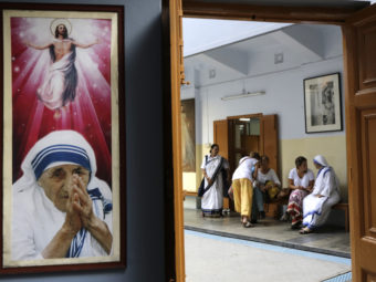 Catholic nuns attend visitors at the Missionaries of Charity house in Kolkata on Aug. 26. (Photo by Bikas Das/Associated Press)