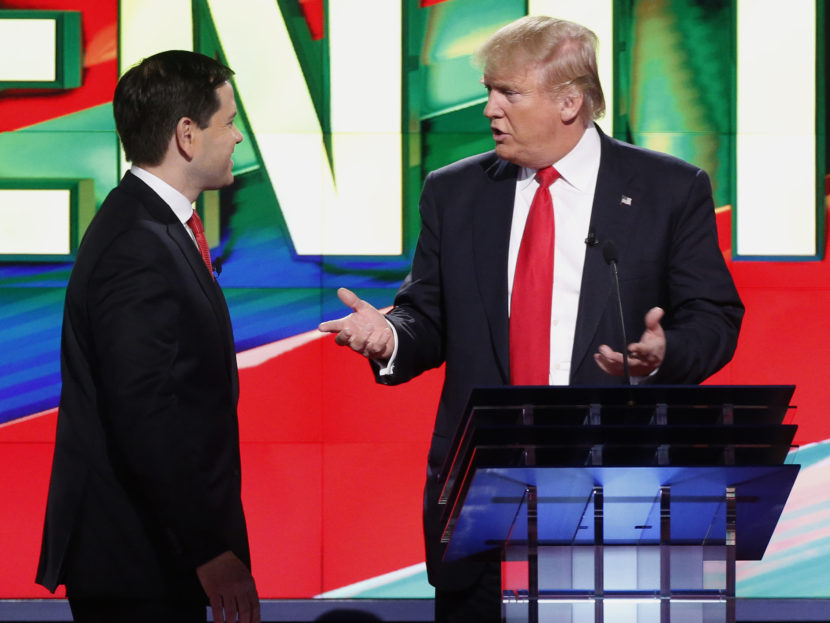 Republicans Donald Trump, right and Sen. Marco Rubio R-Fla., during a break in a Republican presidential debate in March. (Wilfredo Lee, Associated Press)