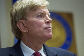 Former Ku Klux Klan leader David Duke talks to the media at the Louisiana secretary of state's office in Baton Rouge, La., on July 22, after registering to run for the U.S. Senate. "The climate of this country has moved in my direction," Duke said as he announced his candidacy, one day after Donald Trump accepted the GOP nomination for president. Max Becherer/AP