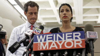 Anthony Weiner (left) and Huma Abedin at a news conference in 2013 during Weiner's mayoral campaign. (Photo by Kathy Willens/Associated Press)