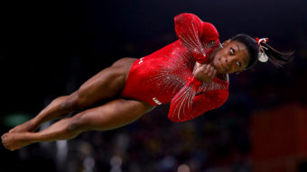 Simone Biles won the women's vault final in the Rio Olympic Arena, setting a new mark for wins in a single Olympics by an American woman. Ryan Pierse/Getty Images
