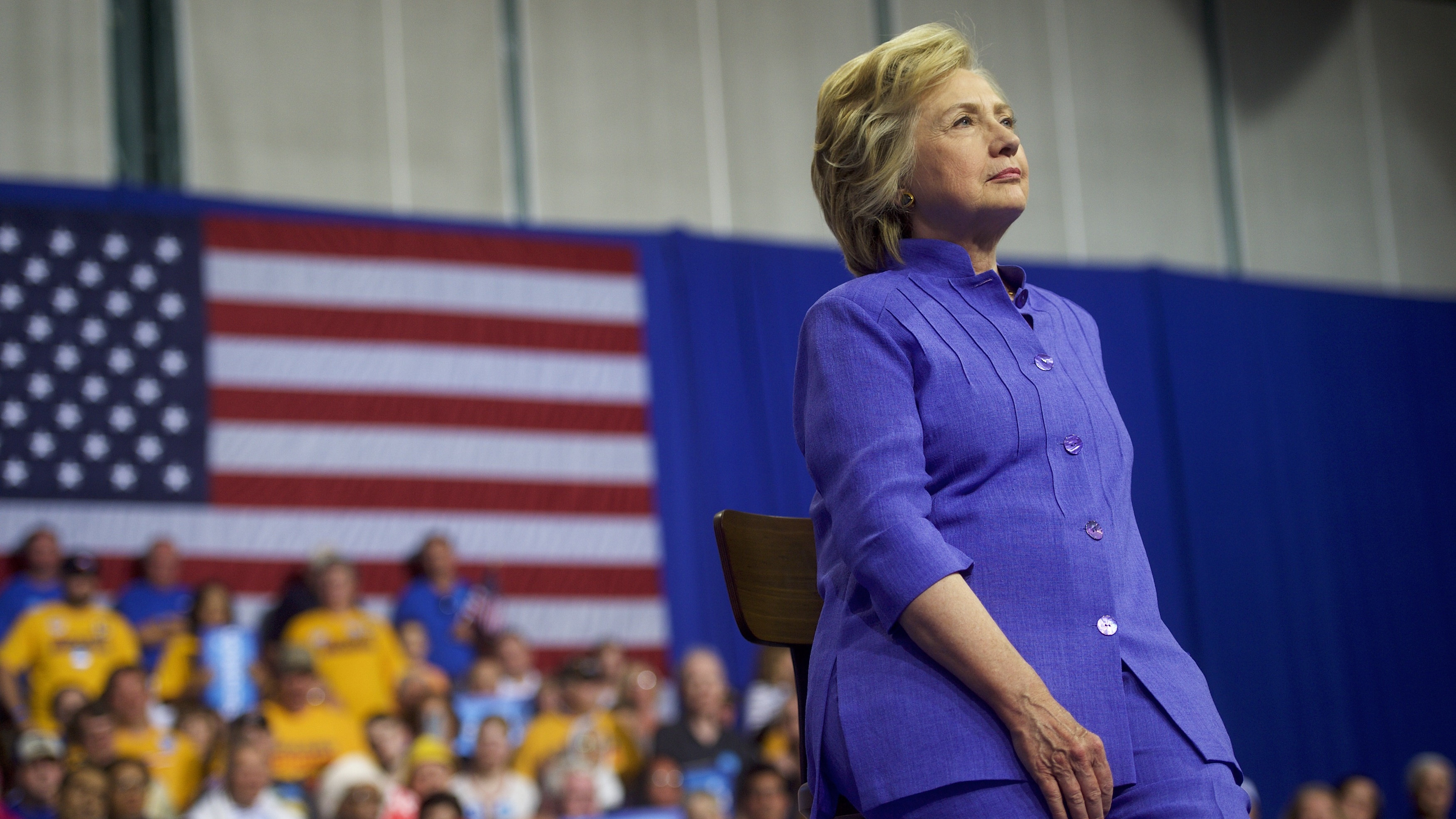 Hillary Clinton sat on a stool while Joe Biden spoke this week. Does that mean she's too frail to be president? (Photo by Mark Makela/Getty Images)