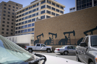 Pump jacks decorate the side of a building in downtown Midland. (Ilana Panich-Linsman for NPR)