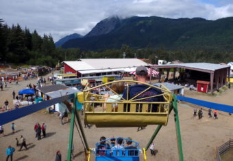 Fairgoers ride the Ferris wheel at the 48th annual Southeast Alaska State Fair. (Photos by KHNS)