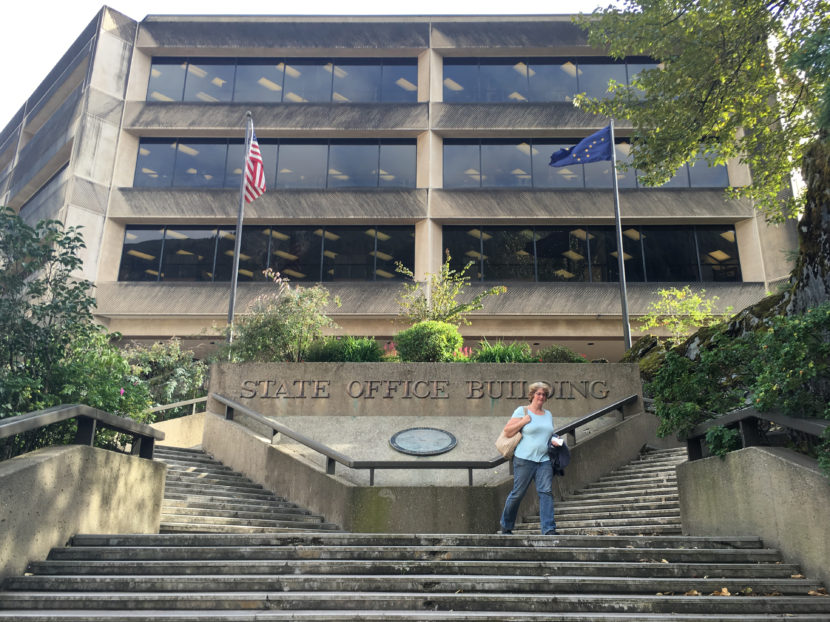 State and local government workers receive similar compensation to priv-ate-sector workers, according to an Institute of Social and Economic Research report. State Office Building. Aug. 5, 2016.(Photo by Andrew Kitchenman/KTOO)