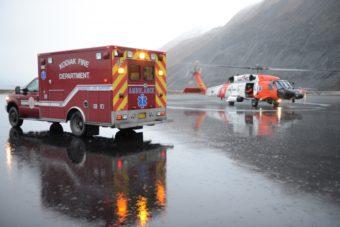 A Coast Guard Air Station Kodiak, Alaska, MH-60 Jayhawk helicopter crew transfers a patient to an ambulance in Kodiak, Alaska, Feb. 19, 2016. The patient was medevaced from fishing vessel Providence in Lazy Bay on the southern point of Kodiak Island.
