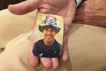 Michael Burke keeps in his wallet a photo of his brother, FDNY Captain William Burke Jr., who was one of the first responders killed at the World Trade Center. Hansi Lo Wang/NPR