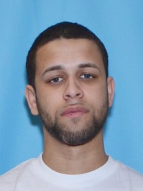 Christian Andre Young, 24, is wanted by law enforcement but slipped away from a near arrest Friday afternoon by the Dillingham Airport. (Alaska State Troopers)