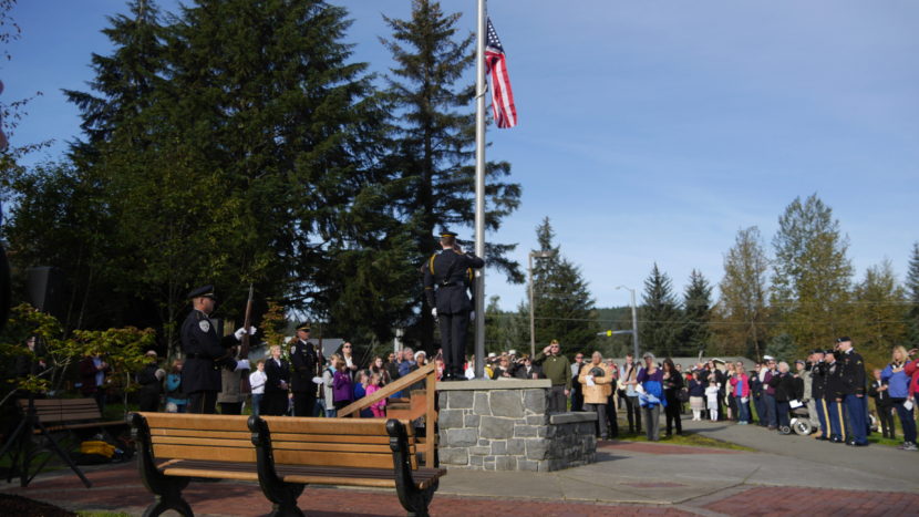 The Juneau Police Department's honor guard raised the flag to half-staff at the memorial on Sunday.