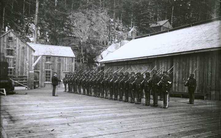 African American Soldiers stand at attention in Dyea, Alaska 1899. (Photo courtesy of Alaska State Library ASL-P226-867)