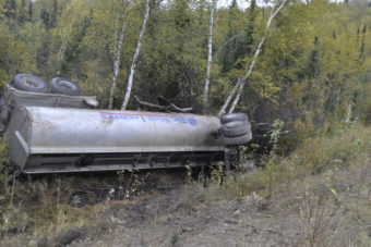 Investigators say multiple punctures enabled most of the 5,000 gallons of diesel fuel in this tanker to quickly leak out after it overturned Monday near the intersection of Lost Lake Road and the Richardson Highway. (Photo courtesy of Alaska Department of Environmental Conservation)