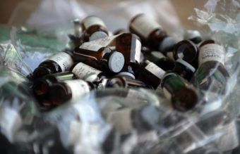 These glass capsules contain the drug ketamine. (Photo by Nicolas Asfouri/AFP/Getty Images)