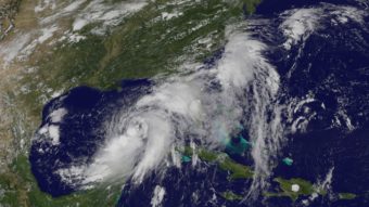A satellite image shows Tropical Storm Hermine forming in the Gulf of Mexico on Wednesday. The storm is expected to make landfall north of Tampa late Thursday night or early Friday morning, the National Hurricane Center says. (NASA/NOAA GOES Project)