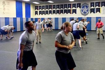 Trainees participate in a tactical defense class at the Dallas Police Basic Training Academy. The officer deaths in July strengthened the camaraderie among recruits training at the academy. (Photo by Yvonne Muther/NPR)