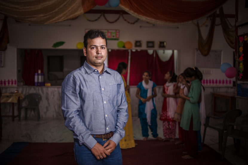 As a college student, Mahendra Sharma took on the challenge of convincing fathers to send their daughters to the Veerni Institute. He now serves as its director. Poulomi Basu for NPR
