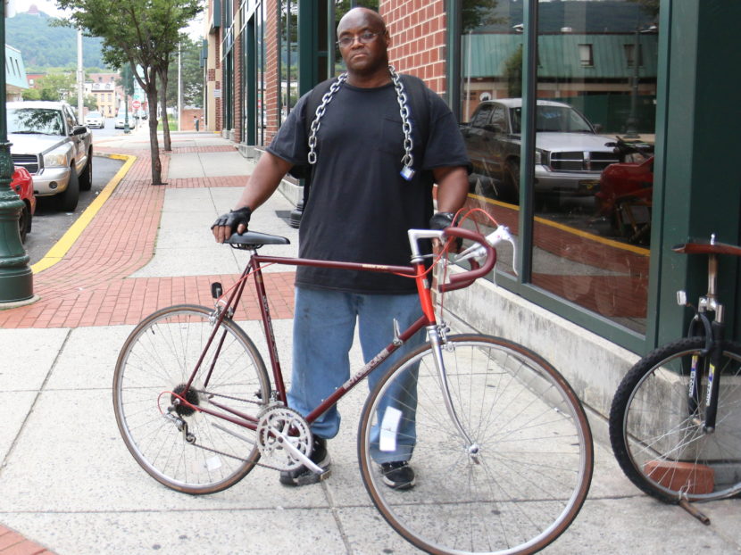 Harrison Walker, 54, lives in Reading and doesn't own a car, so he bikes everywhere. (Photo by Marielle Segarra/WHYY)