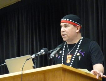 The Tlingit-Haida Central Council's Rob Sanderson Jr. talks about transboundary mining concerns at a Native Issues Form on March 9, 2016, in Juneau. (Photo by Ed Schoenfeld/CoastAlaska News)