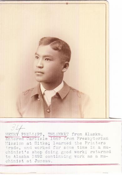 Henry Phillips, originally "Ka-Ka-Ish," was 12 years old in 1887 when he arrived at the Carlisle Industrial Indian School in Pennsylvania. His student file says he arrived from the Presbyterian Mission in Sitka, though both of his parents were still living. He returned to Skagway to work as a printer at the Daily Alaskan newspaper. (Public Domain image from National Archives and Records Administration)