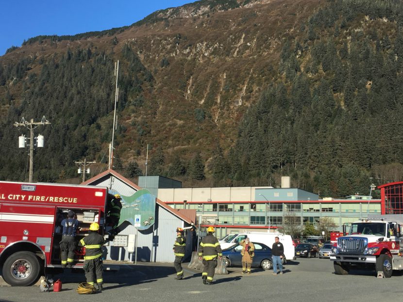 Emergency officials arrive on scene of a small barge fire near Aurora Harbor. (Lakeidra Chavis/ KTOO)