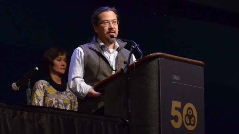 Joe Nelson withdrew his candidacy for co-chair of the Alaska Federation of Natives board at the 2016 convention. Behind him is co-chair Ana Hoffman. (Photo by Jennifer Canfield)