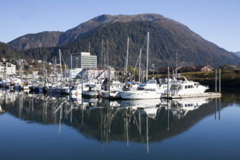 Boats lined up in Harris Harbor on a sunny, clear day Wednesday, Oct. 12, 2016 in downtown Juneau, Alaska. (Photo by Rashah McChesney/Alaska’s Energy Desk)