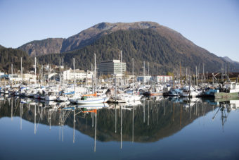 Boats lined up in Harris Harbor on a sunny, clear day Wednesday, Oct. 12, 2016 in downtown Juneau, Alaska. (Photo by Rashah McChesney/Alaska’s Energy Desk)